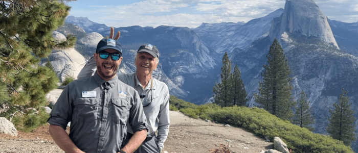 Ewart and Goehring pose goofily at Glacier Point